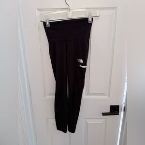 The North Face Black High-Waisted Leggings.  Not sure of size.  Looks like a 6
